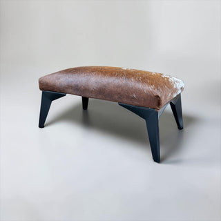 Exact cowhide ottoman