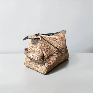 Floral embossed leather makeup bag