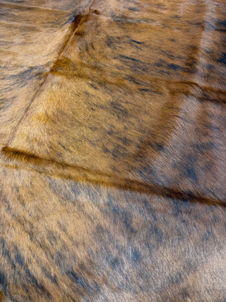 6.9’x5.7’ Brazilian cowhide rug (A9)