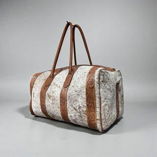 Tan tooled leather & cowhide duffle bag