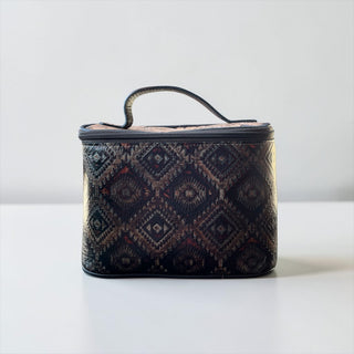 Brown Aztec embossed leather makeup bag