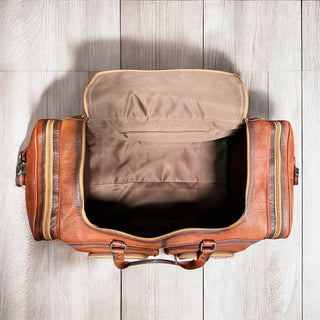 Rustic leather rolling luggage duffle bag
