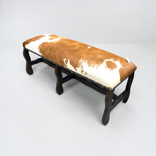 All cowhide wood bench