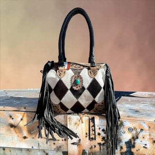 Black cowhide patchwork fringe handbag