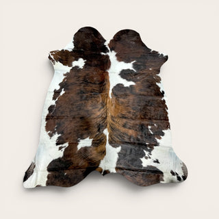 H6.5 x 6w ft Brazilian cowhide rug ($03)