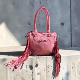 Pink fringe leather handbag