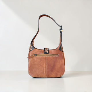 Floral tooled leather & cowhide shoulder bag