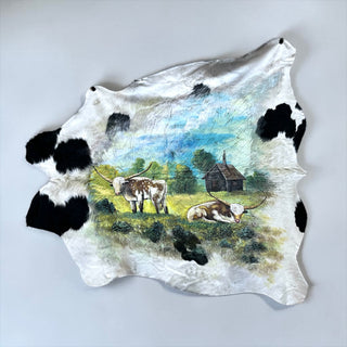 7-8’ hand painted cowhide rug