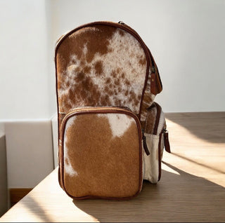 Floral tooled & cowhide backpack