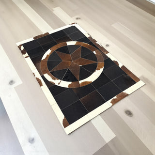 Star cowhide patchwork rug 4x6’