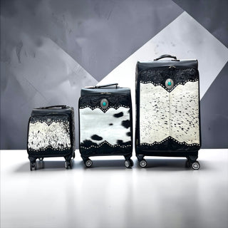 Black tooled leather & cowhide luggage