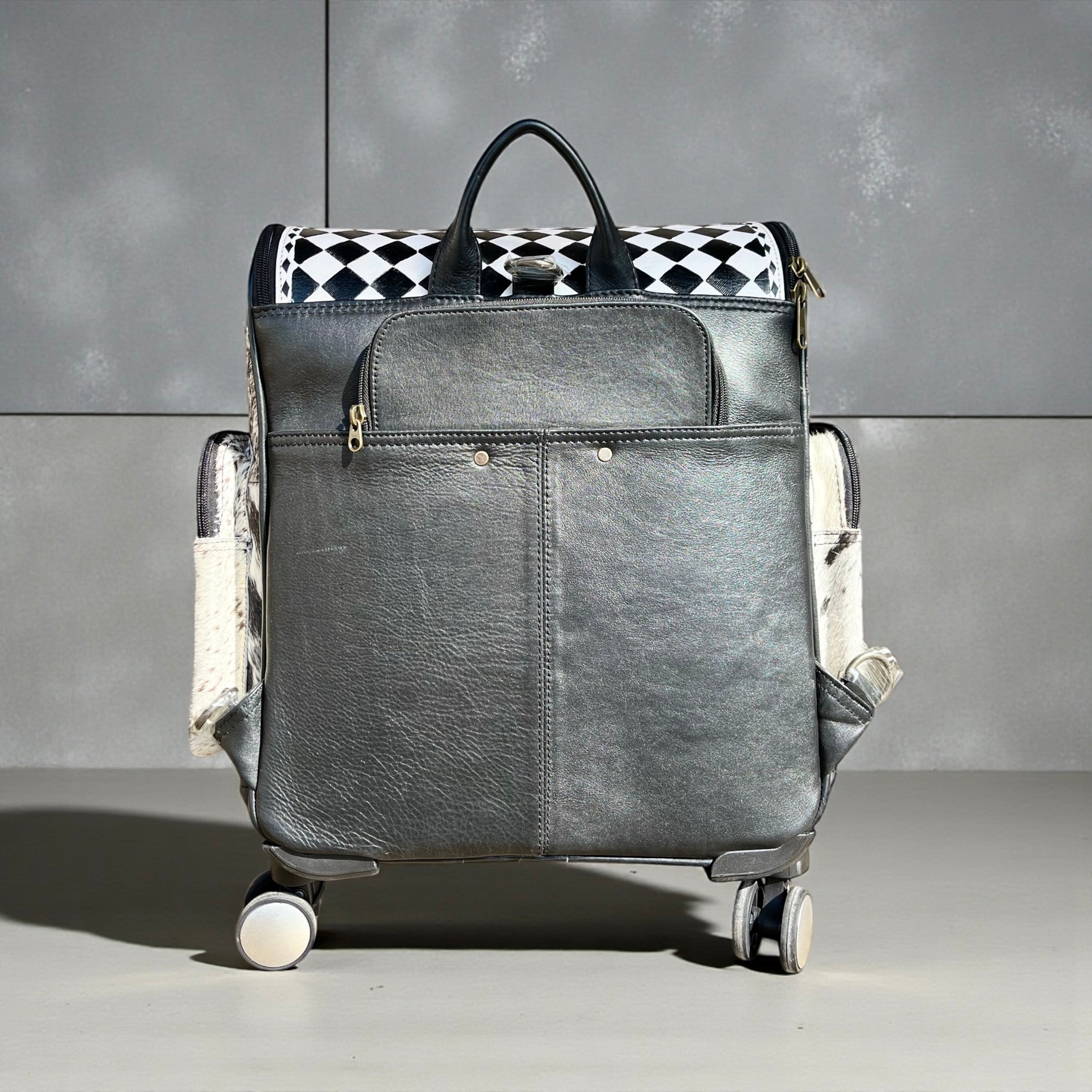 Checker leather & cowhide rolling backpack