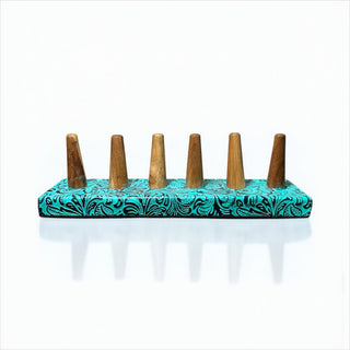 Turquoise tooled leather ring display