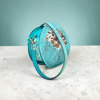 Turquoise tooled leather & cowhide canteen bag
