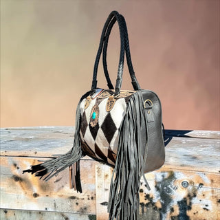 Black cowhide patchwork fringe handbag