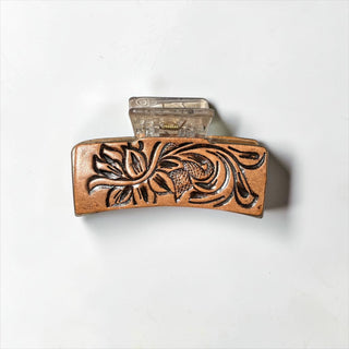 Leather blossom hair claw