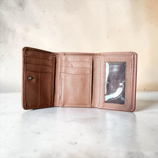 Skull tooled leather wallet