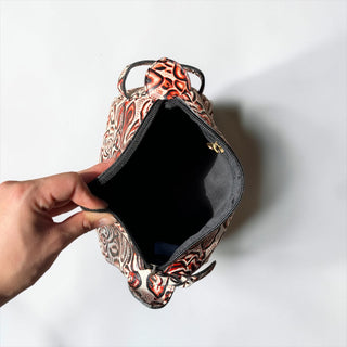 Aztec embossed leather makeup bag