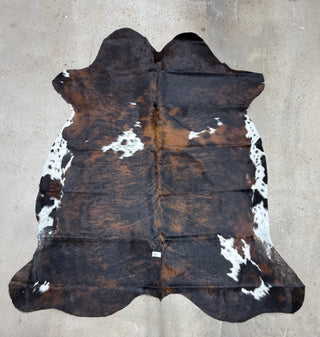 6.8’x5.11’ Brazilian cowhide rug (A6)