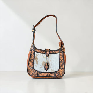 Floral tooled leather & cowhide shoulder bag