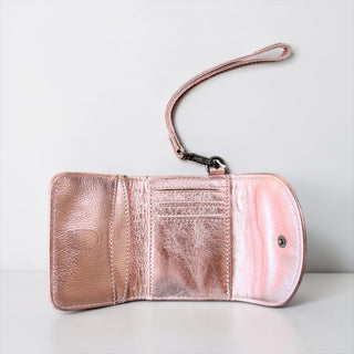 Rose gold tooled leather wristlet wallet