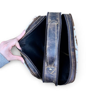 Blossom tooled leather toiletry bag