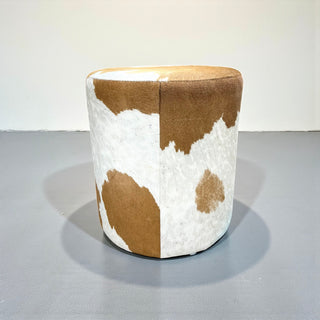 Tan all cowhide ottoman