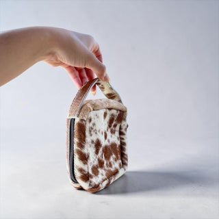 Tan all cowhide makeup bag