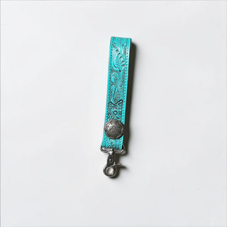 Turquoise tooled leather wristlet