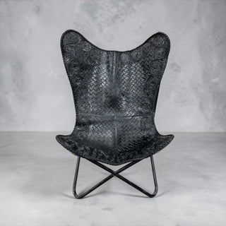 Black tooled leather butterfly chair