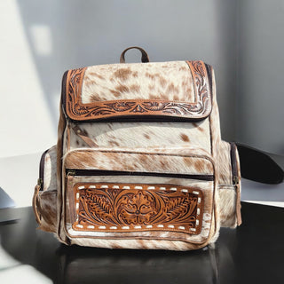 Tan tooled & cowhide backpack
