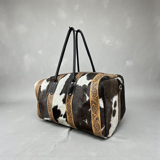 Brown/black tooled leather & cowhide duffle bag