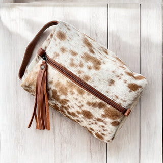 Tan cowhide toiletry bag