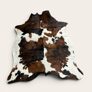 6-7’ Brazilian cowhide rug (r15)