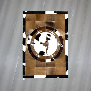 Longhorn cowhide patchwork rug 4x6’