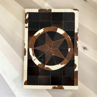 Star cowhide patchwork rug 4x6’