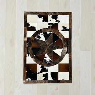 Star cowhide patchwork rug 4x6’