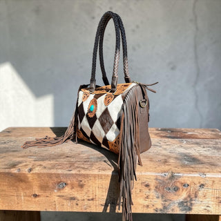 Brown cowhide patchwork fringe handbag