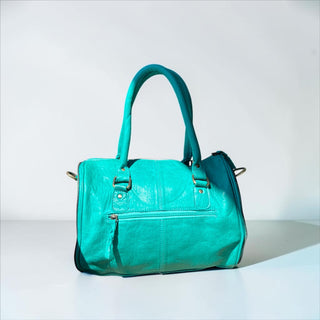Turquoise tooled leather & cowhide speedy bag
